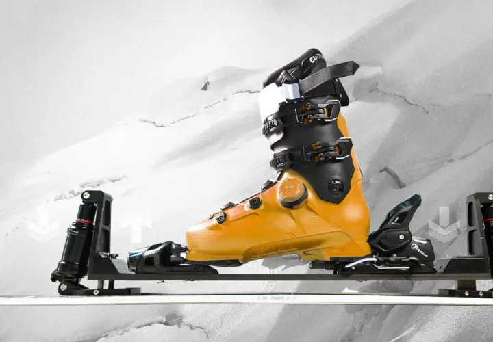 Bota de esquí naranja con fijaciones GripWalk y sistema BOA, lista para la nieve.